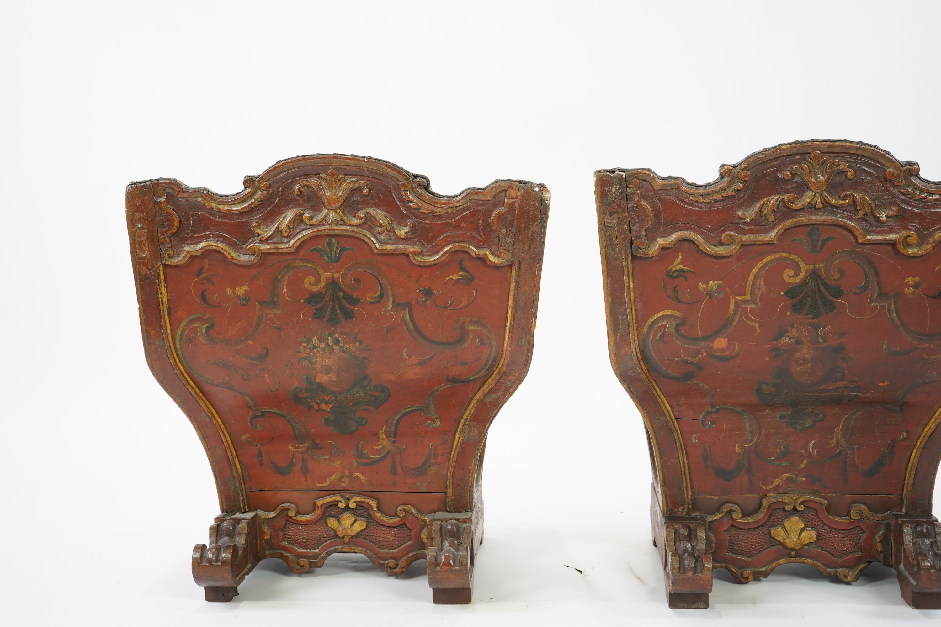 A pair of 19th century Venetian carved wood and tan leather Gondola seats
